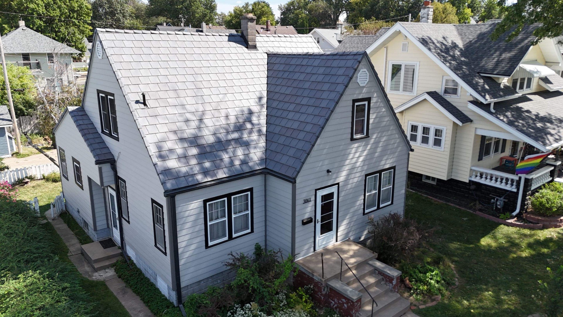 Full roof & siding replacement — After